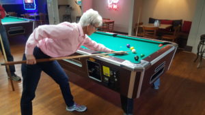 Sr. Barbara "Pool Shark" Kennedy limbers up for the party.